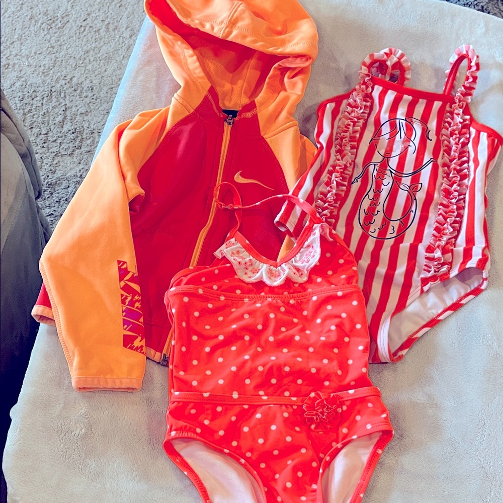 Nike Kids Red and Orange zip up hoodie and two bathing suits